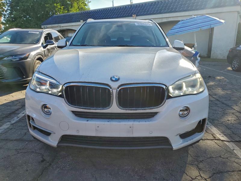Photo 5 from auction – 2015 BMW X5 XDRIVE3 with VIN 5UXKR0C56F0P14258