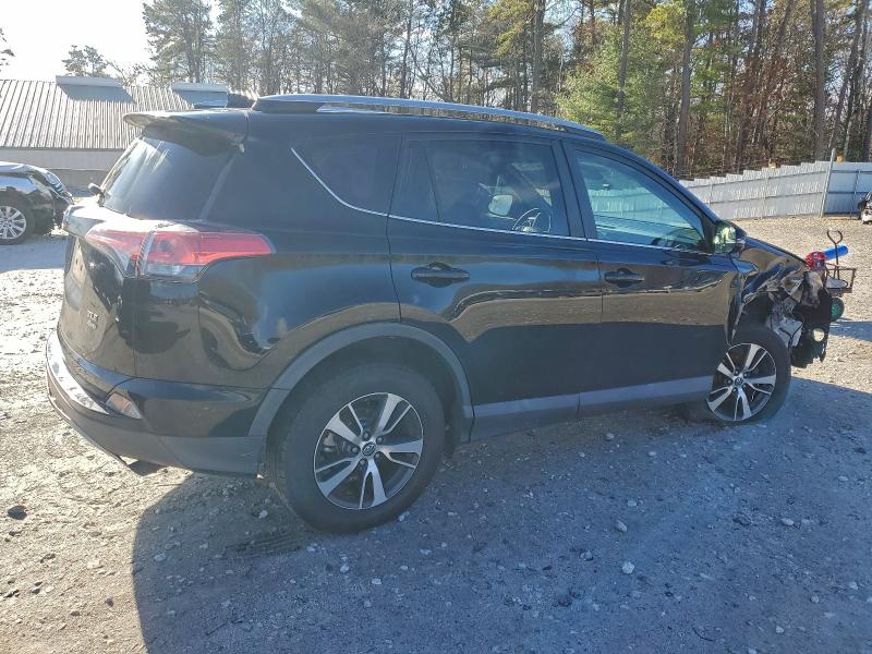 Photo 3 from auction – 2017 TOYOTA RAV4 XLE with VIN 2T3RFREV0HW545136