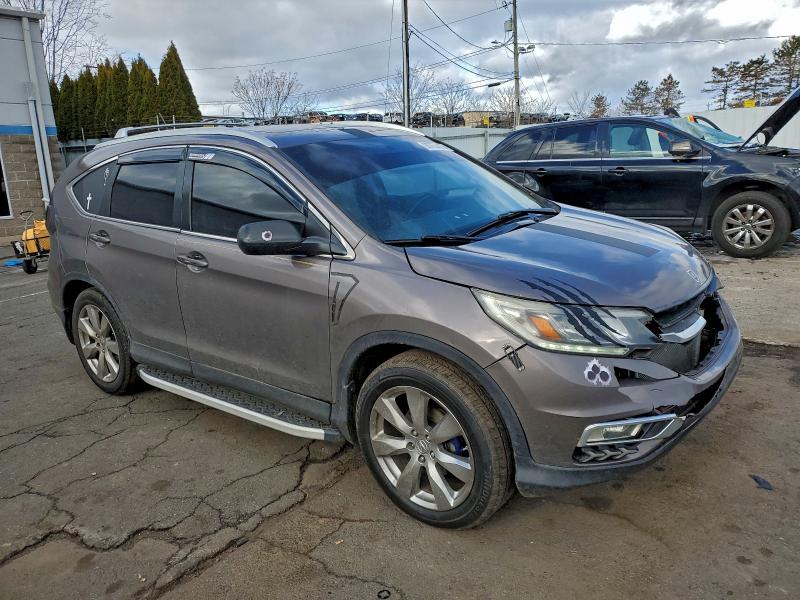 Photo 4 from auction – 2015 HONDA CR-V EXL with VIN 2HKRM3H79FH528131