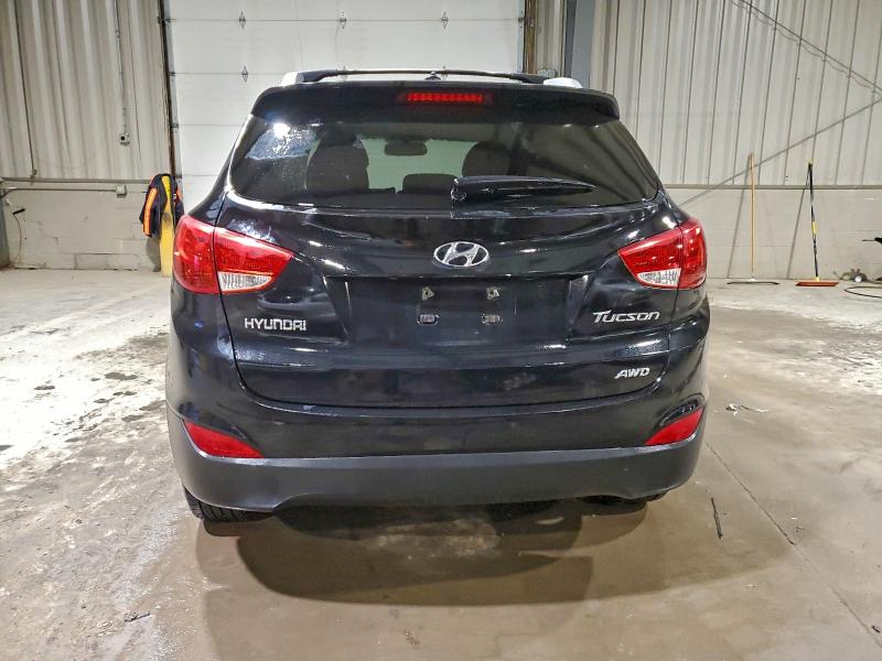 Photo 6 from auction – 2012 HYUNDAI TUCSON GLS with VIN KM8JUCAC9CU350660