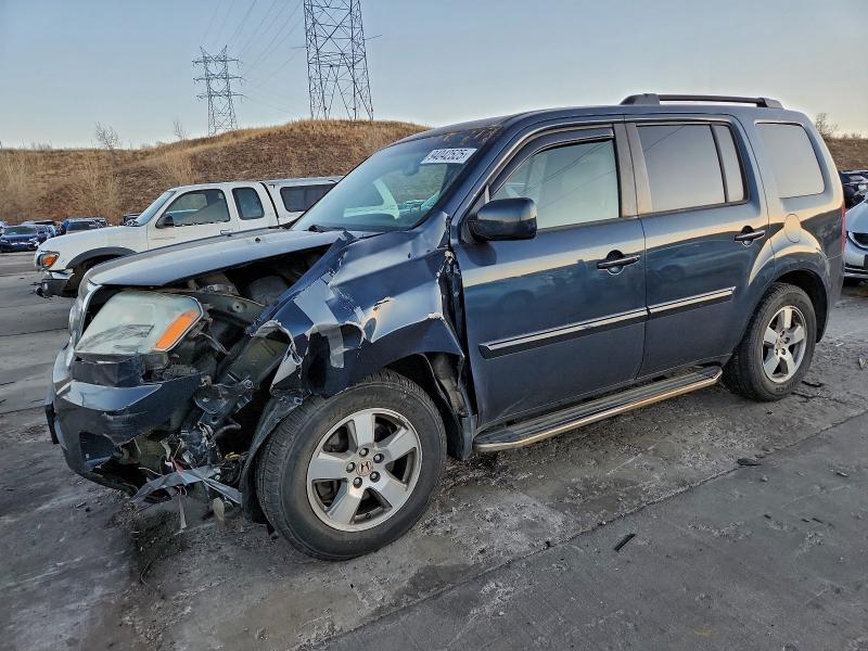 HONDA PILOT EXL 2011 with VIN 5FNYF4H63BB001780 - Photo from auction