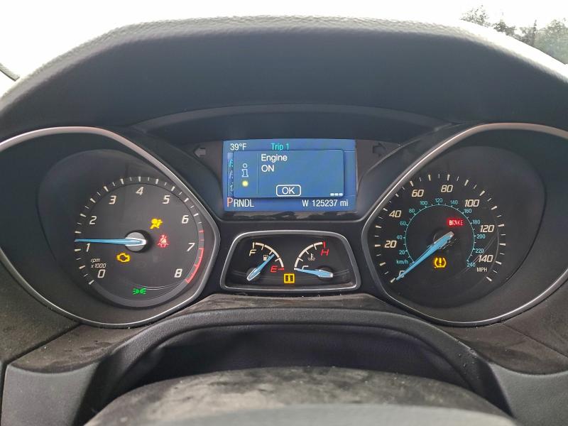 Photo 9 from auction – 2014 FORD FOCUS with VIN 1FADP3K24EL266680