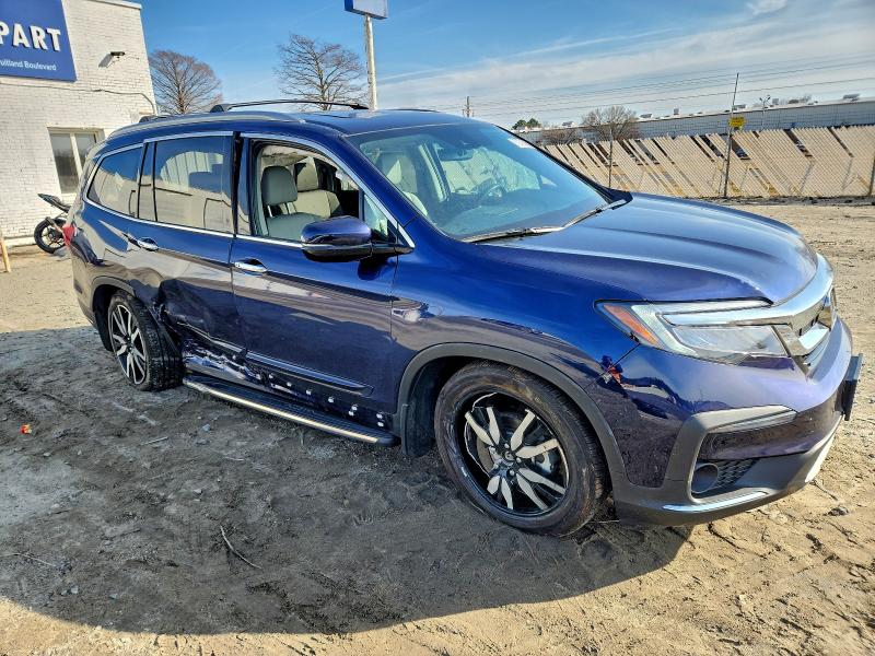 Photo 4 from auction – 2022 HONDA PILOT TOUR with VIN 5FNYF5H67NB017538