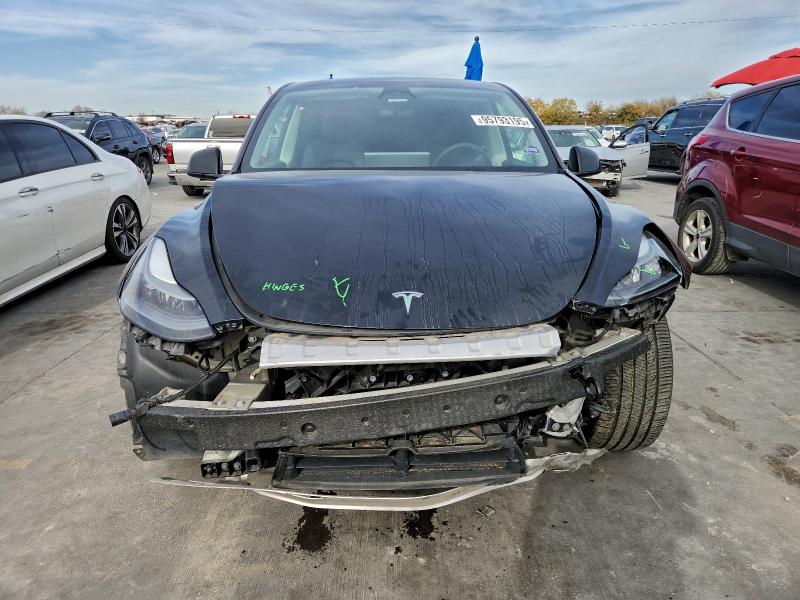 Photo 5 from auction – 2023 TESLA MODEL Y with VIN 7SAYGDEF2PF602061