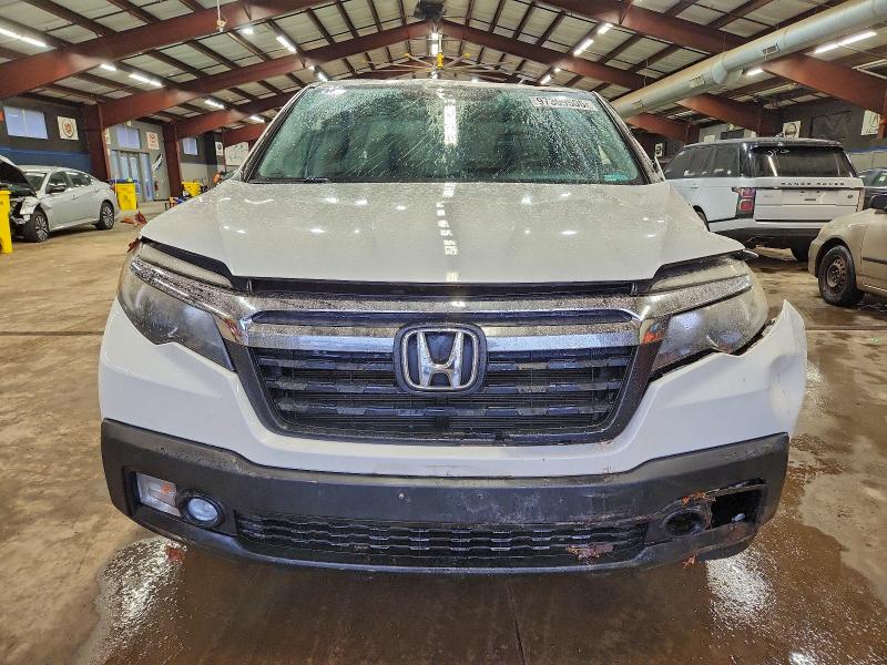 Photo 5 from auction – 2017 HONDA RIDGELINE with VIN 5FPYK3F56HB003779