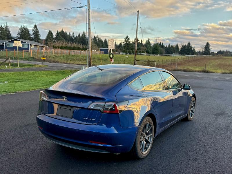 Photo 4 from auction – 2022 TESLA MODEL 3 with VIN 5YJ3E1EB3NF286627
