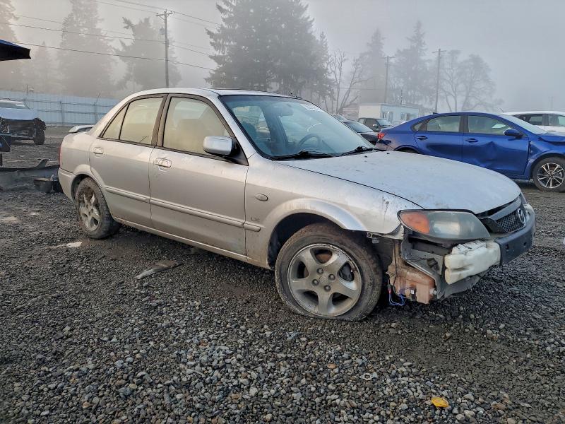 Photo 4 from auction – 2002 MAZDA PROTEGE DX with VIN JM1BJ225221616323
