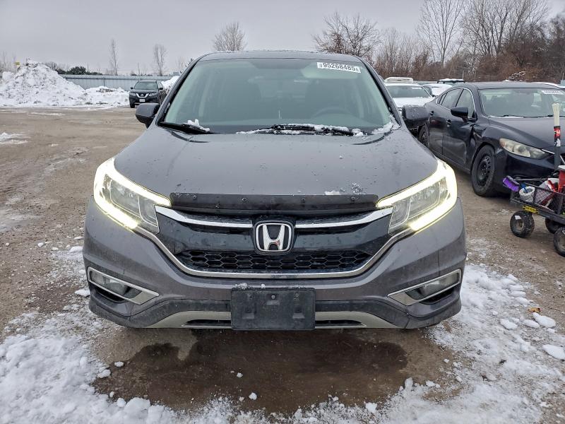 Photo 5 from auction – 2015 HONDA CR-V EX with VIN 2HKRM4H50FH102476