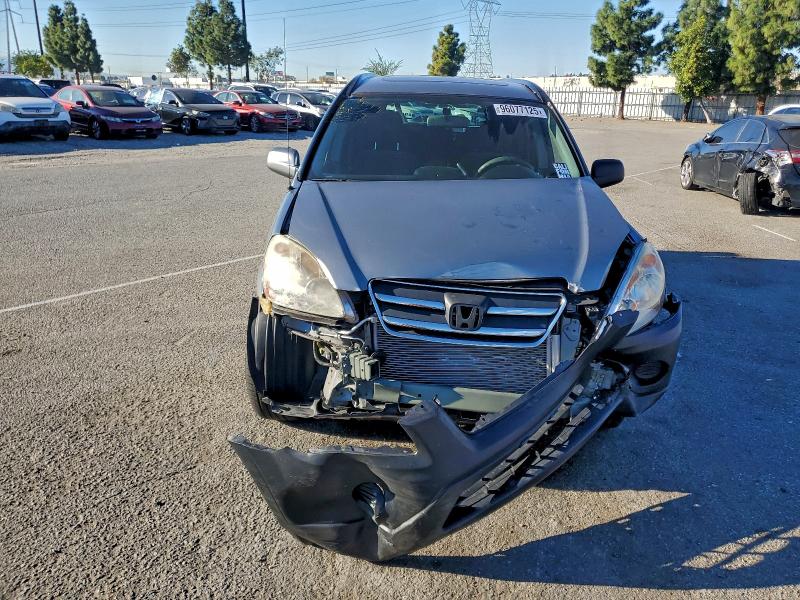 Photo 5 from auction – 2006 HONDA CR-V EX with VIN JHLRD68856C024202