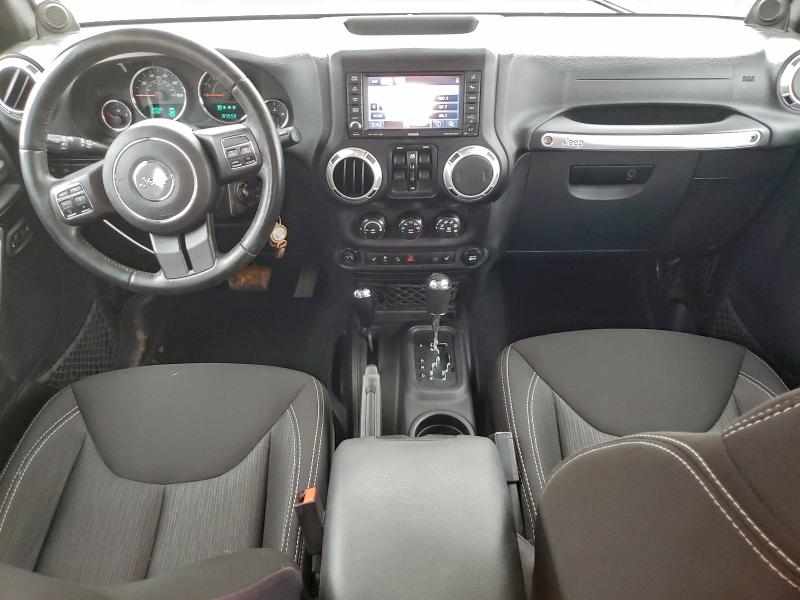 Photo 8 from auction – 2014 JEEP WRANGLER U with VIN 1C4HJWFGXEL223434