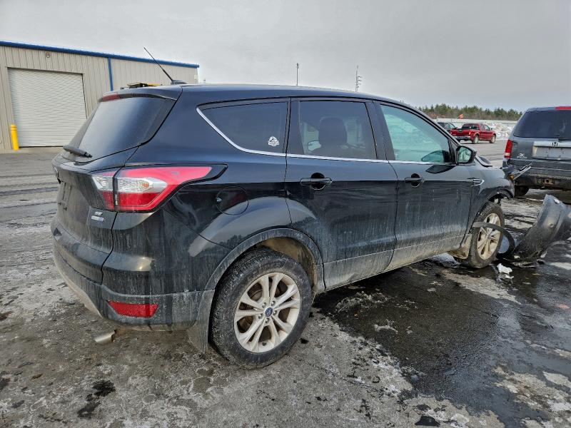 Photo 3 from auction – 2017 FORD ESCAPE SE with VIN 1FMCU9GD1HUD98785