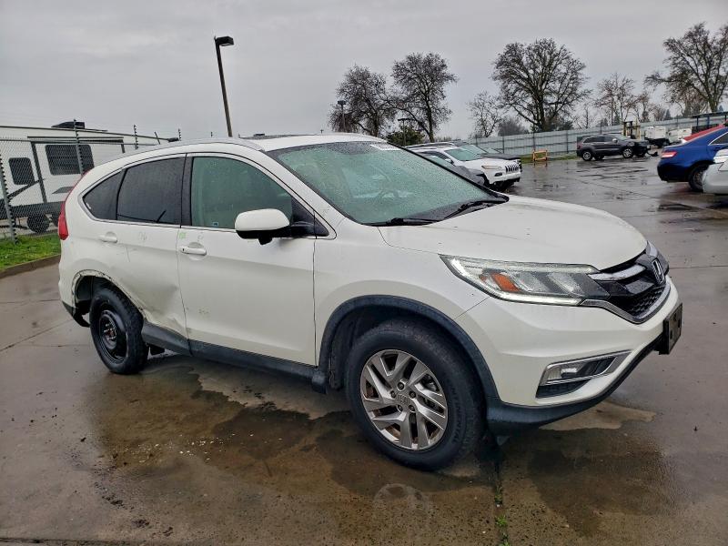 Photo 4 from auction – 2015 HONDA CR-V EXL with VIN 5J6RM4H78FL057701