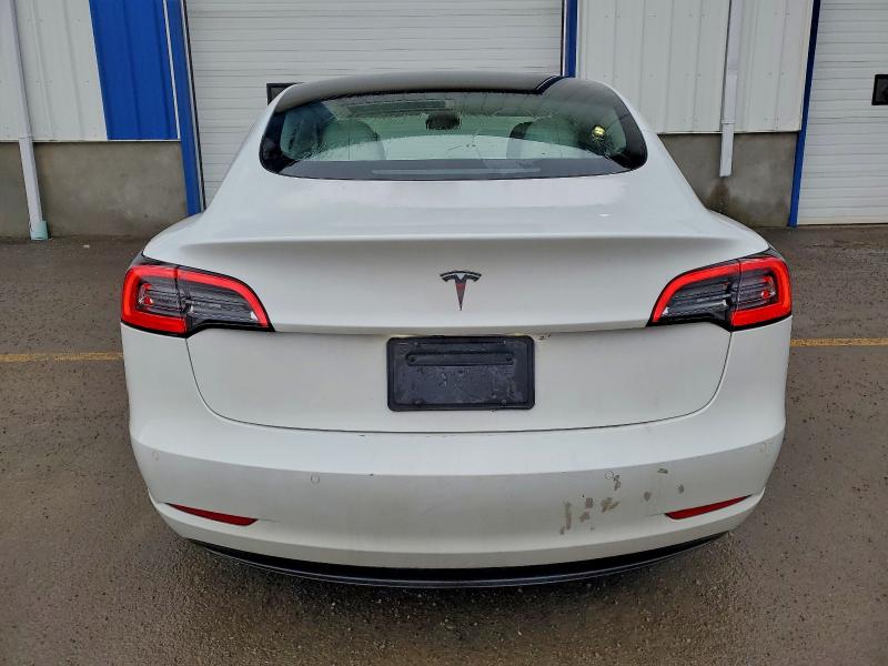 Photo 6 from auction – 2022 TESLA MODEL 3 with VIN 5YJ3E1EAXNF361914