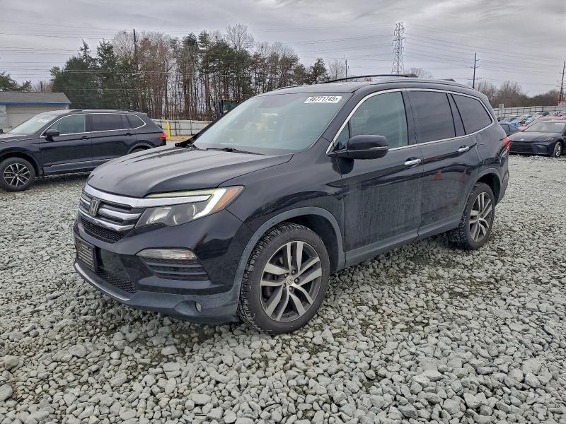 Photo 1 from auction – 2016 HONDA PILOT TOUR with VIN 5FNYF6H93GB071616