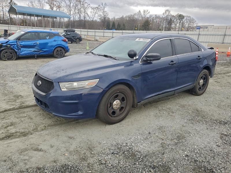 FORD TAURUS POL 2015 with VIN 1FAHP2L88FG200111 - Photo from auction