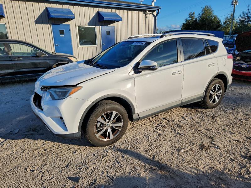 TOYOTA RAV4 XLE 2016 with VIN 2T3WFREV5GW261566 - Photo from auction