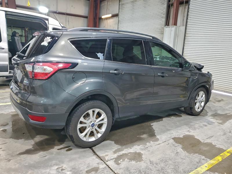 Photo 3 from auction – 2018 FORD ESCAPE SE with VIN 1FMCU9GD6JUD46560