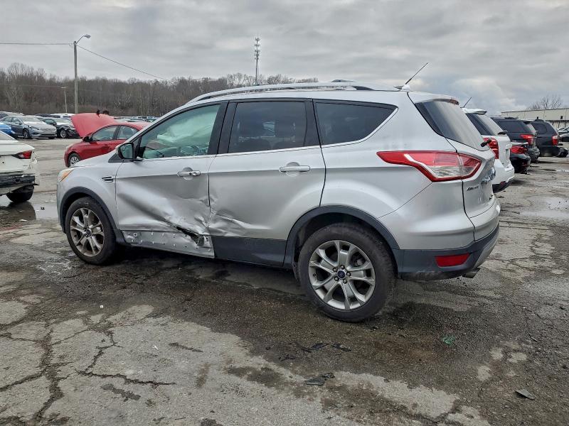 Photo 2 from auction – 2016 FORD ESCAPE TIT with VIN 1FMCU0J98GUA74229