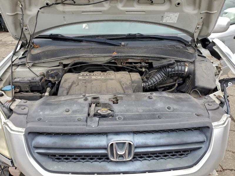 Photo 12 from auction – 2005 HONDA PILOT EX with VIN 2HKYF18475H509012