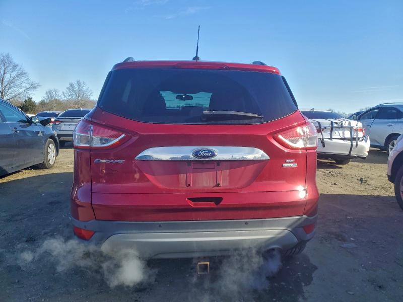 Photo 6 from auction – 2015 FORD ESCAPE SE with VIN 1FMCU9GX8FUB22529