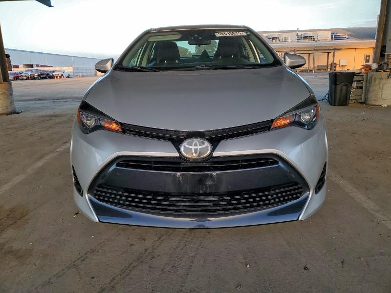 Photo 5 from auction – 2018 TOYOTA COROLLA L with VIN 2T1BURHE2JC968030