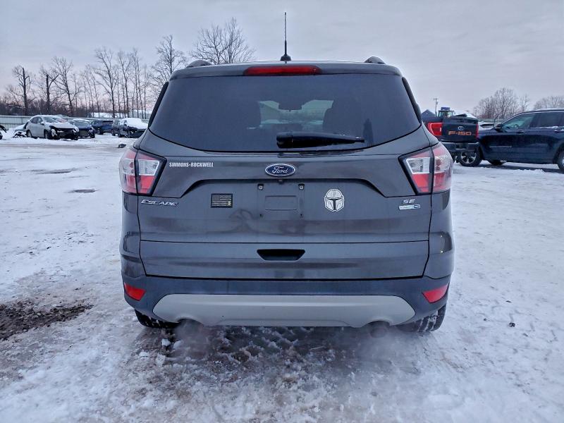 Photo 6 from auction – 2018 FORD ESCAPE SE with VIN 1FMCU9GD8JUA95279