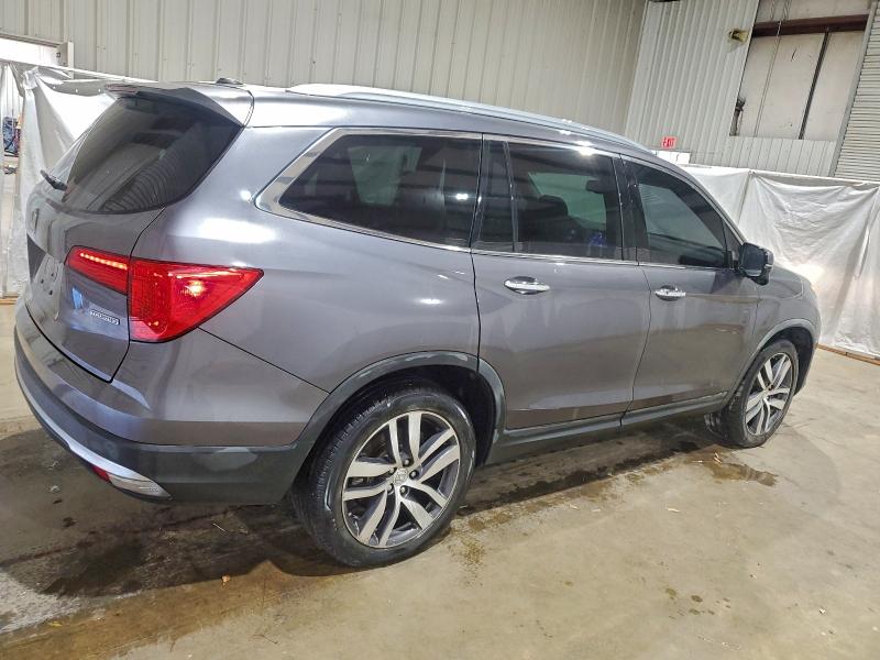Photo 3 from auction – 2017 HONDA PILOT TOUR with VIN 5FNYF5H97HB024245