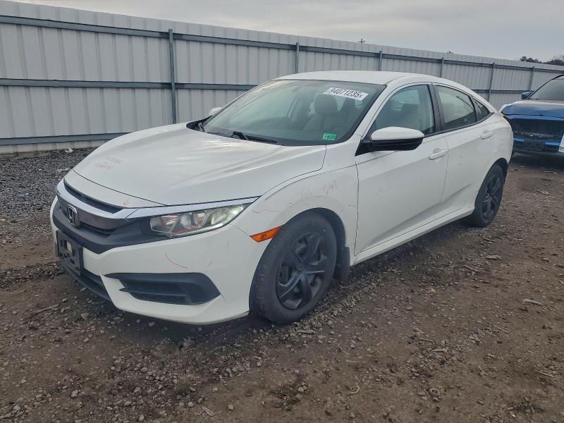 HONDA CIVIC LX 2017 with VIN 2HGFC2F58HH542066 - Photo from auction
