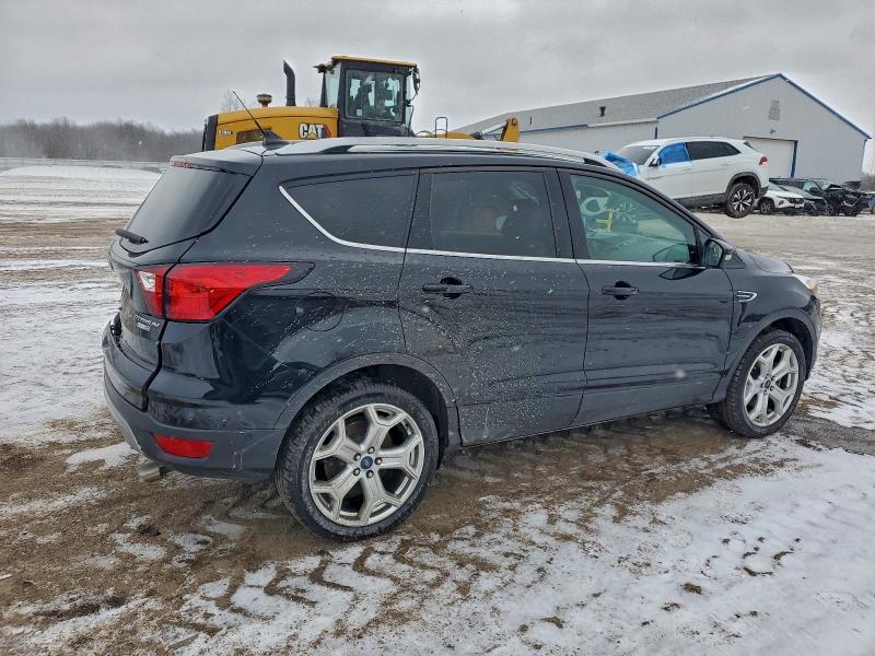 Photo 3 from auction – 2019 FORD ESCAPE TIT with VIN 1FMCU9J9XKUB98516