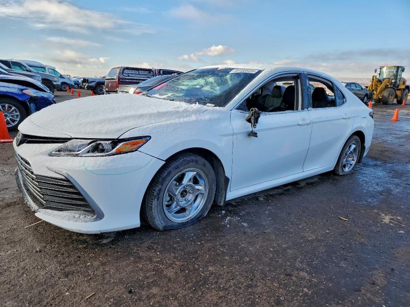TOYOTA CAMRY 2021 with VIN 4T1C11AK4MU410052 - Photo from auction