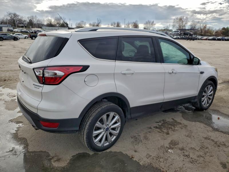 Photo 3 from auction – 2017 FORD ESCAPE with VIN 1FMCU0JD0HUB87873