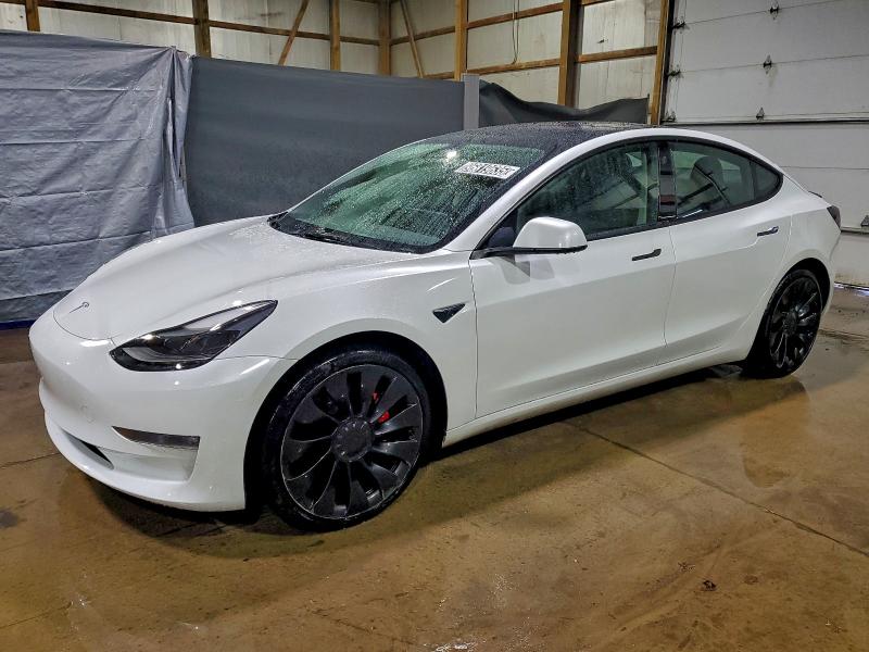 TESLA MODEL 3 2023 with VIN 5YJ3E1EC4PF421237 - Photo from auction