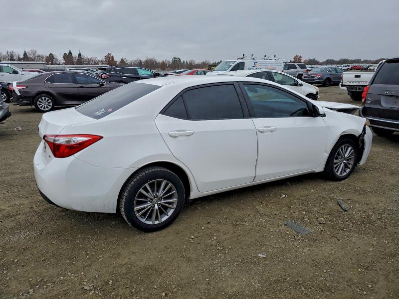 Photo 3 from auction – 2015 TOYOTA COROLLA L with VIN 5YFBURHE7FP256331