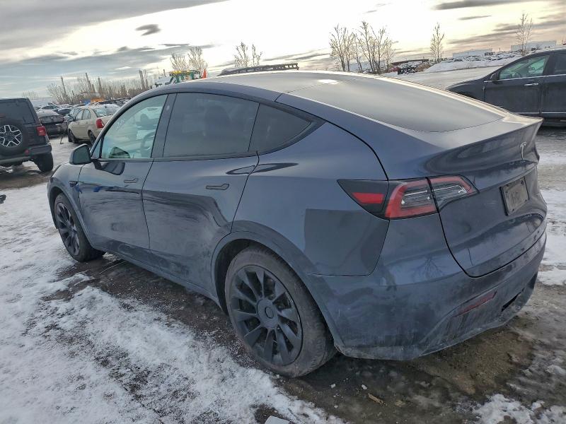 Photo 2 from auction – 2023 TESLA MODEL Y with VIN 7SAYGAEE5PF616784