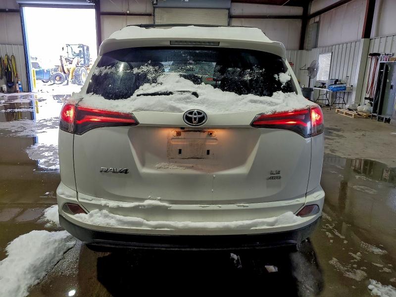 Photo 6 from auction – 2017 TOYOTA RAV4 LE with VIN JTMBFREV8HD205733