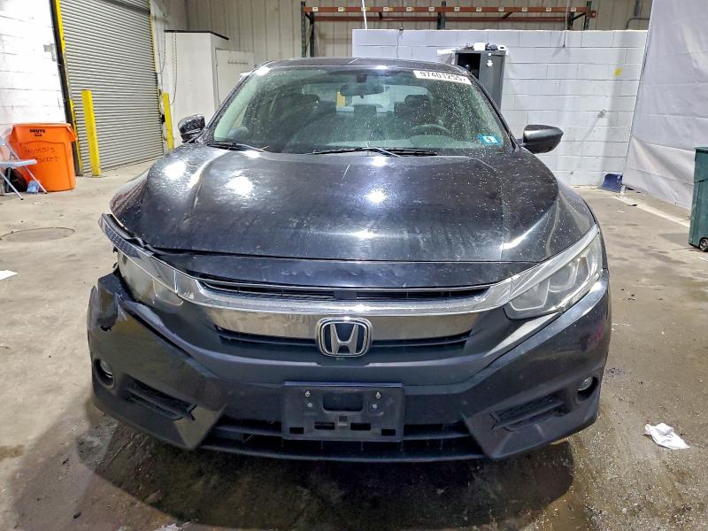 Фото 5 с аукциона – 2016 HONDA CIVIC EX с VIN 19XFC2F78GE209800