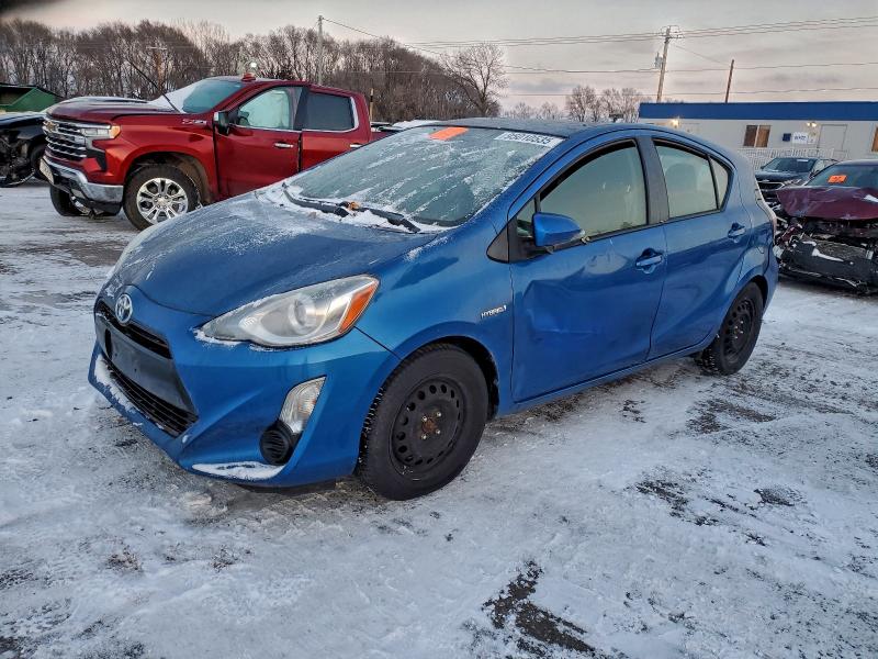 TOYOTA PRIUS C 2015 with VIN JTDKDTB37F1583997 - Photo from auction