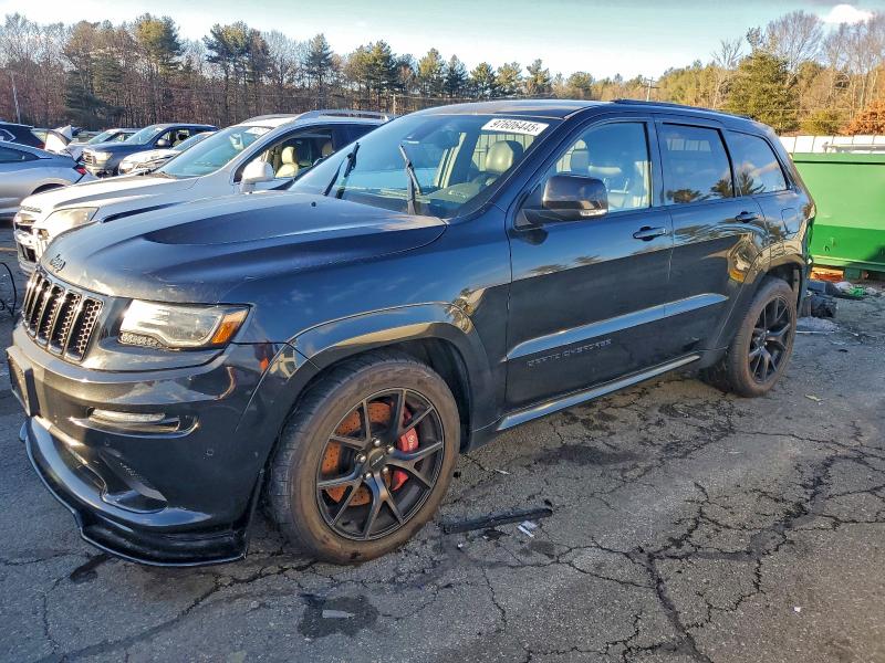 JEEP GRAND CHER 2015 with VIN 1C4RJFDJ7FC659419 - Photo from auction