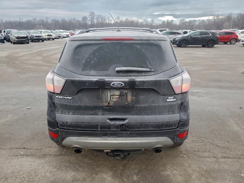Photo 6 from auction – 2017 FORD ESCAPE SE with VIN 1FMCU9GD1HUC45842