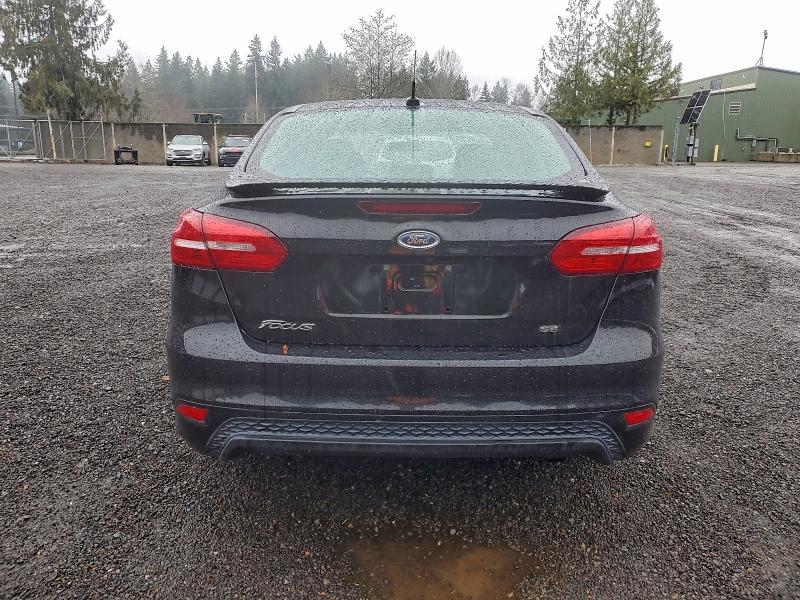 Photo 6 from auction – 2015 FORD FOCUS SE with VIN 1FADP3F23FL249140