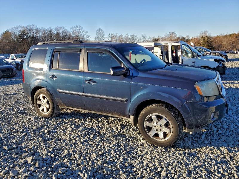 Photo 4 from auction – 2009 HONDA PILOT TOUR with VIN 5FNYF38959B011001