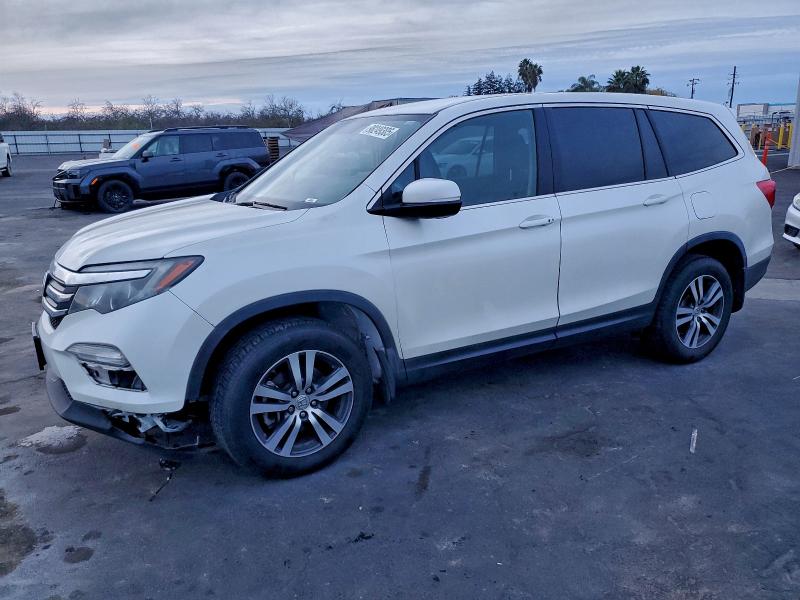 HONDA PILOT EX 2017 with VIN 5FNYF6H38HB013062 - Photo from auction