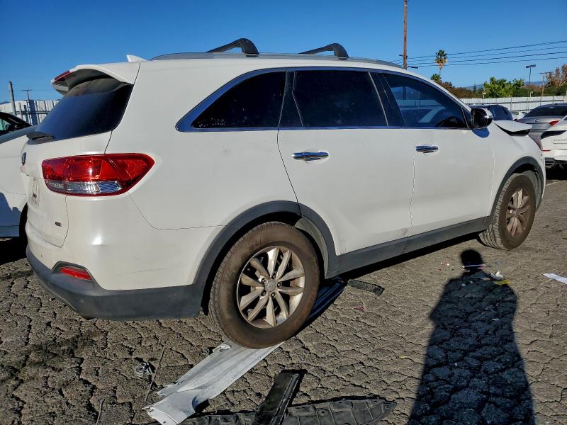 Photo 3 from auction – 2016 KIA SORENTO LX with VIN 5XYPG4A33GG052544