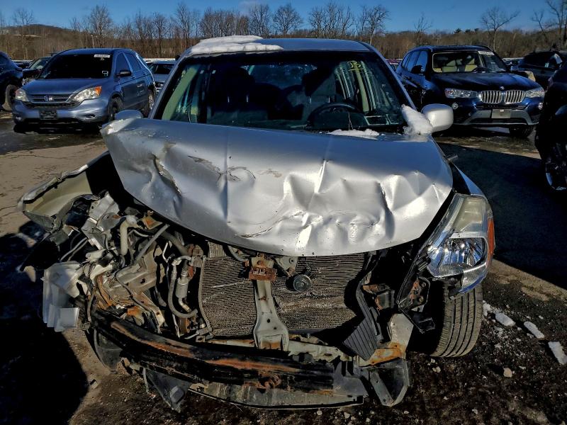Photo 5 from auction – 2011 NISSAN VERSA S with VIN 3N1BC1CP7BL500020