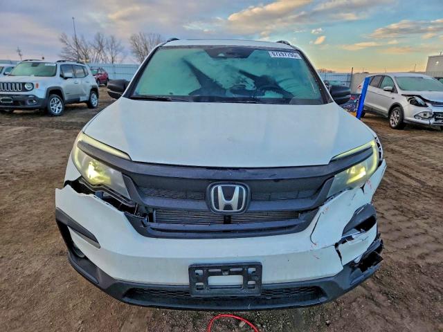 Photo 5 from auction – 2022 HONDA PILOT TRAI with VIN 5FNYF6H81NB022192