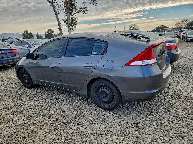 Photo 2 from auction – 2010 HONDA INSIGHT with VIN JHMZE2H55AS021581
