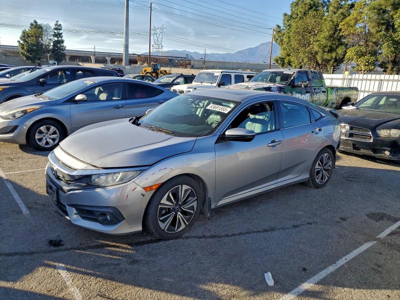 HONDA CIVIC EXL 2016 with VIN 19XFC1F77GE200225 - Photo from auction