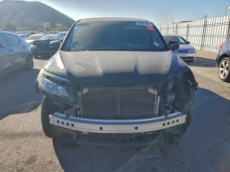 Photo 5 from auction – 2018 HONDA RIDGELINE with VIN 5FPYK3F16JB000142