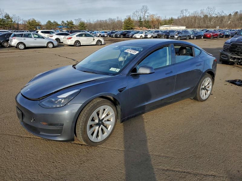 TESLA MODEL 3 2023 with VIN 5YJ3E1EA3PF653987 - Photo from auction