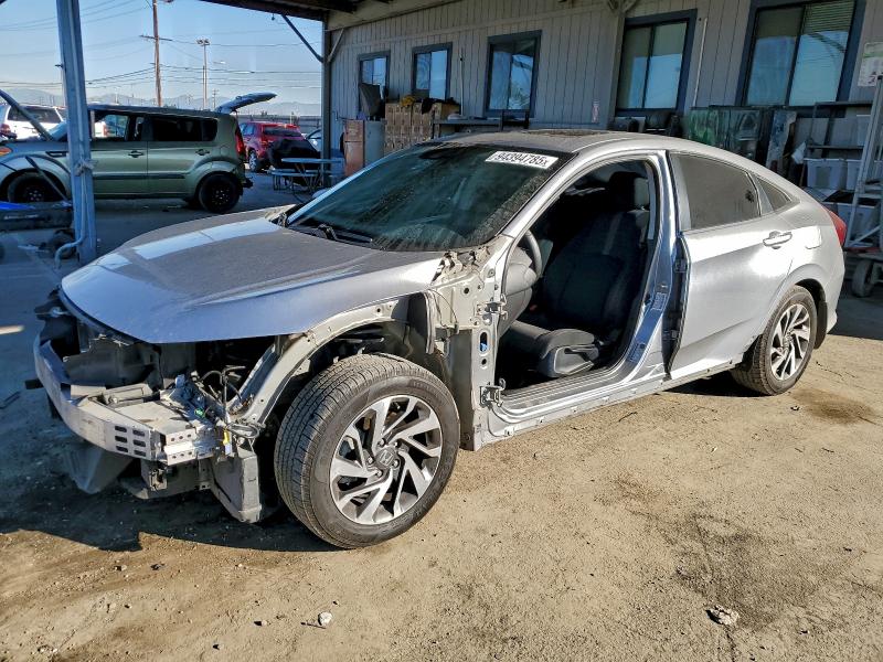 Photo 1 from auction – 2018 HONDA CIVIC EX with VIN 19XFC2F88JE034805